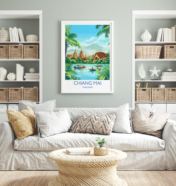 a living room with a large framed poster of a tropical landscape hanging on the wall, depicting a village with palm trees and a river. The poster is surrounded by a white sofa, a coffee table, and a bookshelf filled with books and decorative items.