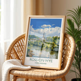A framed poster of Ross-on-Wye, a picturesque town in Herefordshire, England, displayed on a wicker chair.