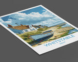 A vintage postcard depicting a coastal village in Kent, England, with a small boat on the shore and colorful houses along the beach.