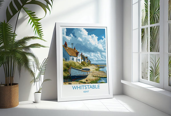 A framed poster of a coastal village in Kent, England, with a boat on the shore and a cloudy sky in the background.