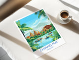 A poster of the city of Chiang Mai, Thailand, featuring a tropical landscape with palm trees, boats, and buildings, along with the text "CHIANG MAI THAILAND" indicating the location.