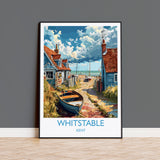 A framed painting depicting a coastal village scene with colorful houses, boats, and a cloudy sky.