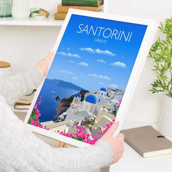 a person holding a tablet with a picture of a city on it
