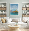 a living room with a white couch and a book shelf