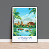 A framed poster depicting the scenic view of Chiang Mai, Thailand, with traditional buildings, palm trees, and boats on the water.