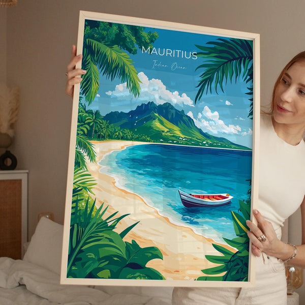 A woman holds up a framed poster of a tropical beach scene with palm trees, a boat, and a mountain in the background.