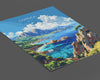 a book with a painting of a beach and mountains in the background